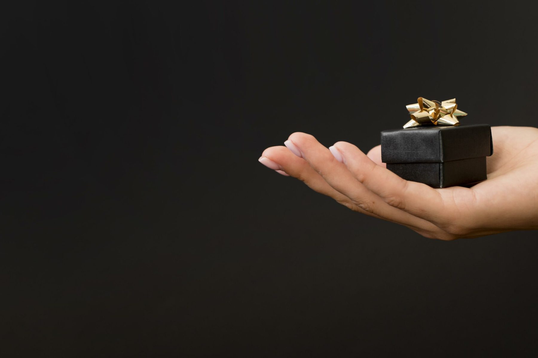 black-gift-box-with-golden-ribbons